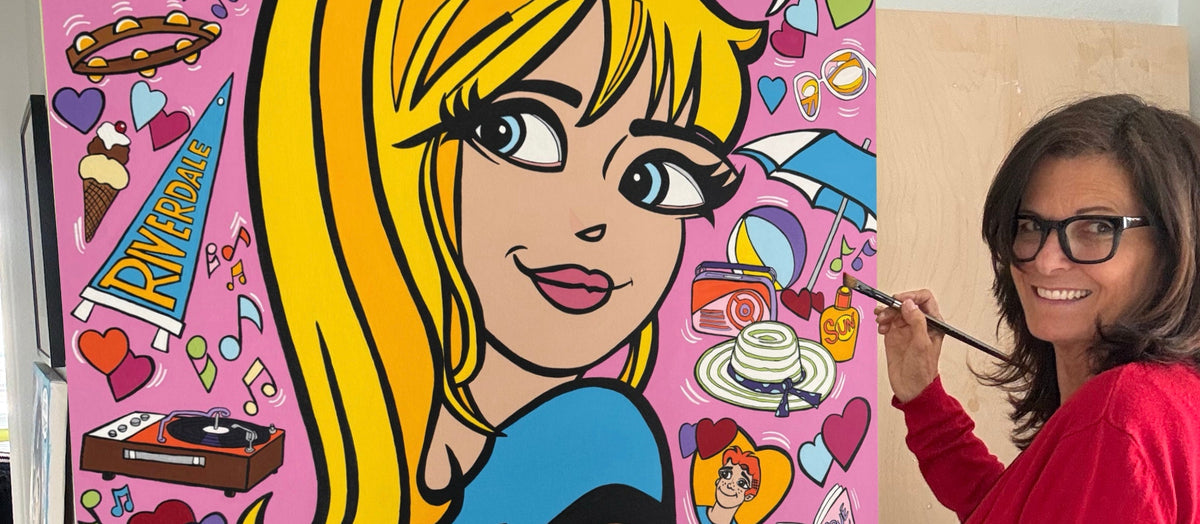 Artist painting a colorful cartoon character on a large canvas