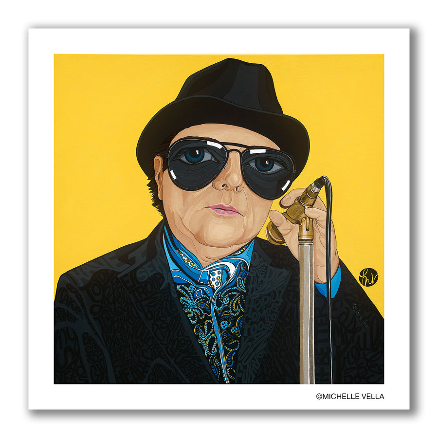 Pop art portrait painting of singer Van Morrison with big eyes wearing black aviator sunglasses and a black fedora, a blue and white paisley shirt and scarf and story telling words describing him written into his black suit jacket while his hand is holding a gold microphone, all on a yellow background